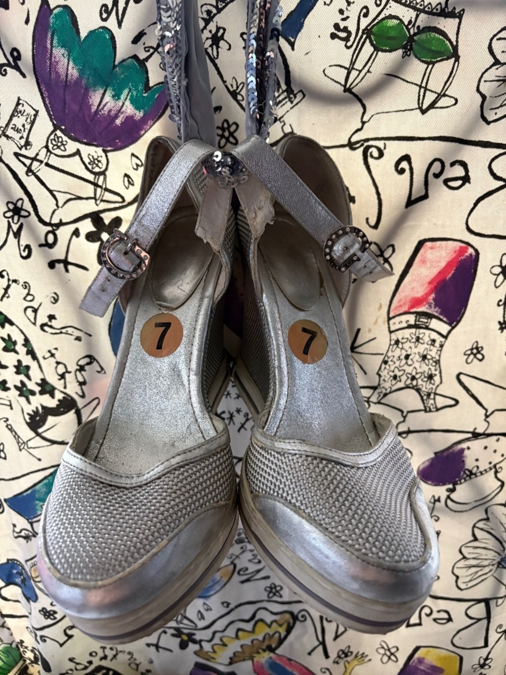 Guess metallic silver platform wedges.